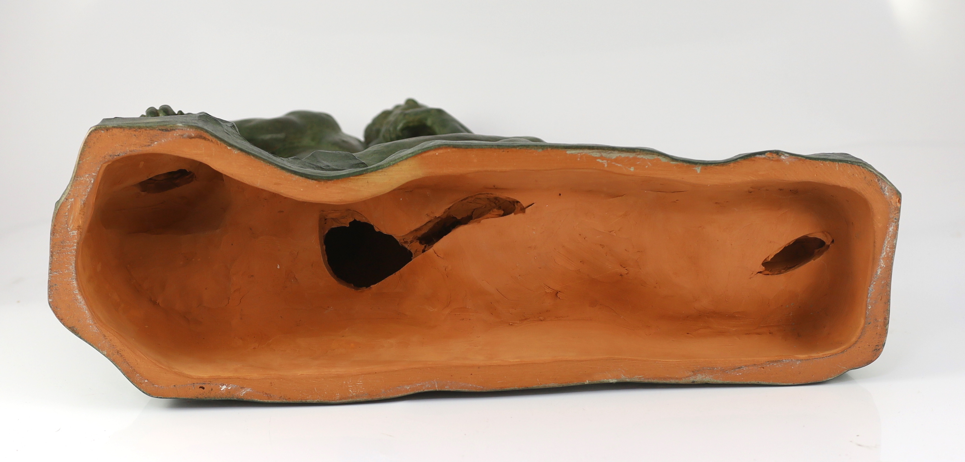 Alexandre Ouline (French, fl.1918-1940). An Art Deco bronzed terracotta sculpture, 50cm wide, 15cm deep, 35cm high